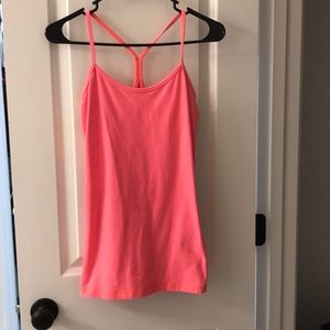 Size 6 lululemon bright coral tank.